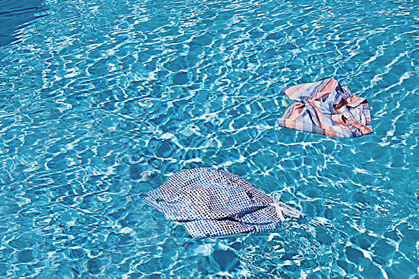 bathing suits floating in pool